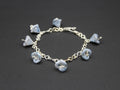 Handcrafted Blue Czech Glass Bell Flower Bracelet in Silver Plated Wire, 7.00"