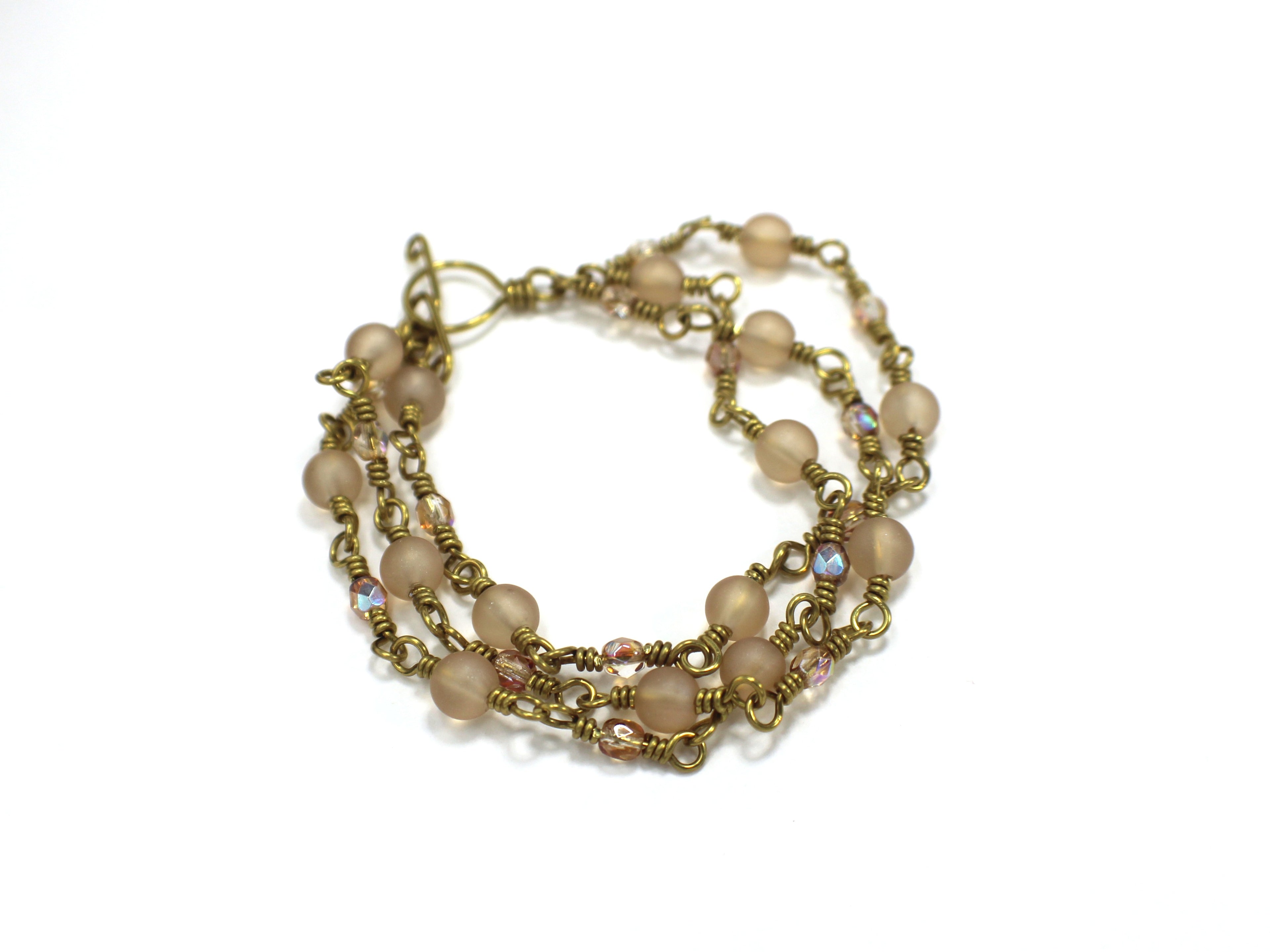 Handcrafted Triple Strand Frosted Glass and Faceted Bead Bracelet in Brass, 6.5"