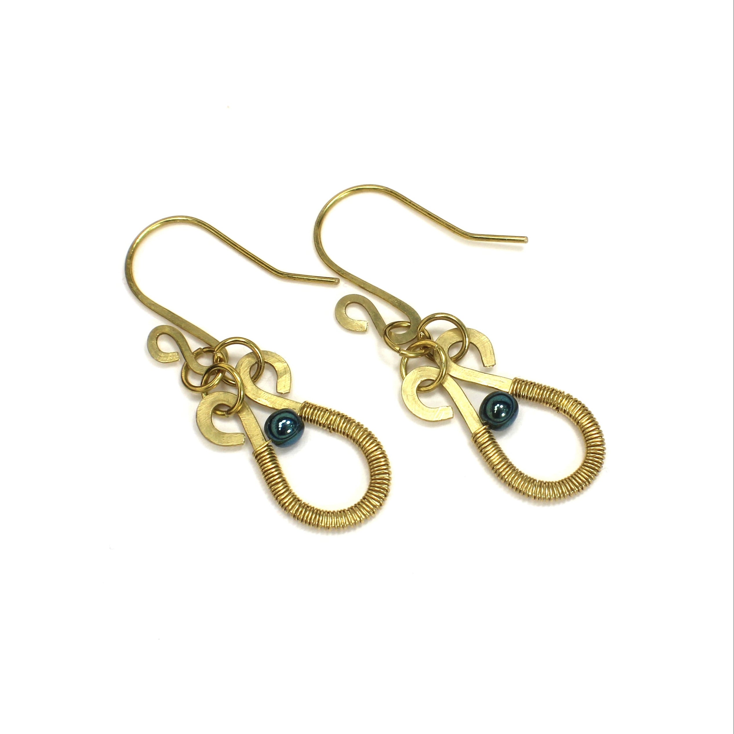 Hammered brass teardrop earrings wire-wrapped with metallic teal bead accents on a white background