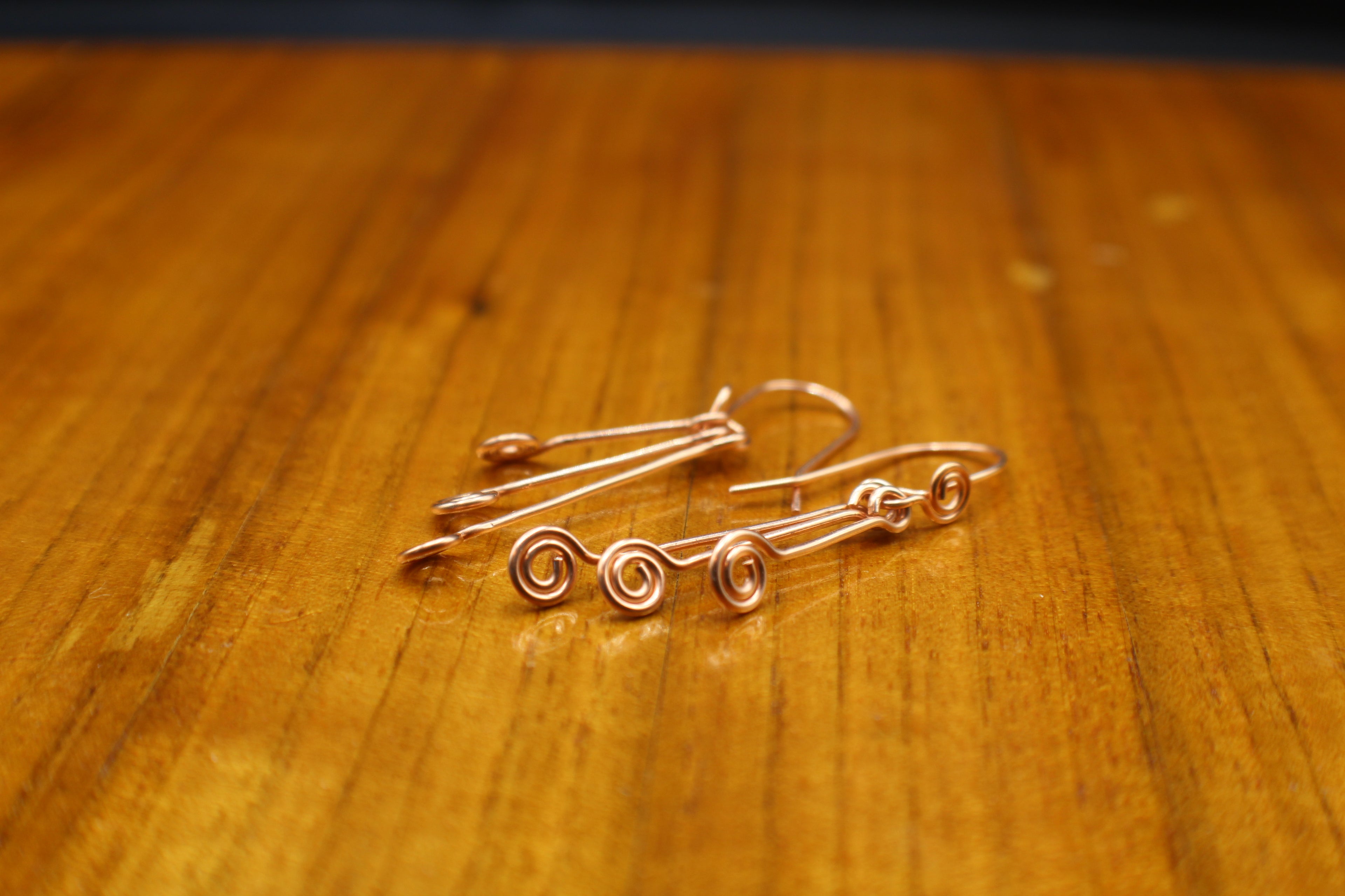 Handcrafted Triple Spiral Dangle Earrings in Copper
