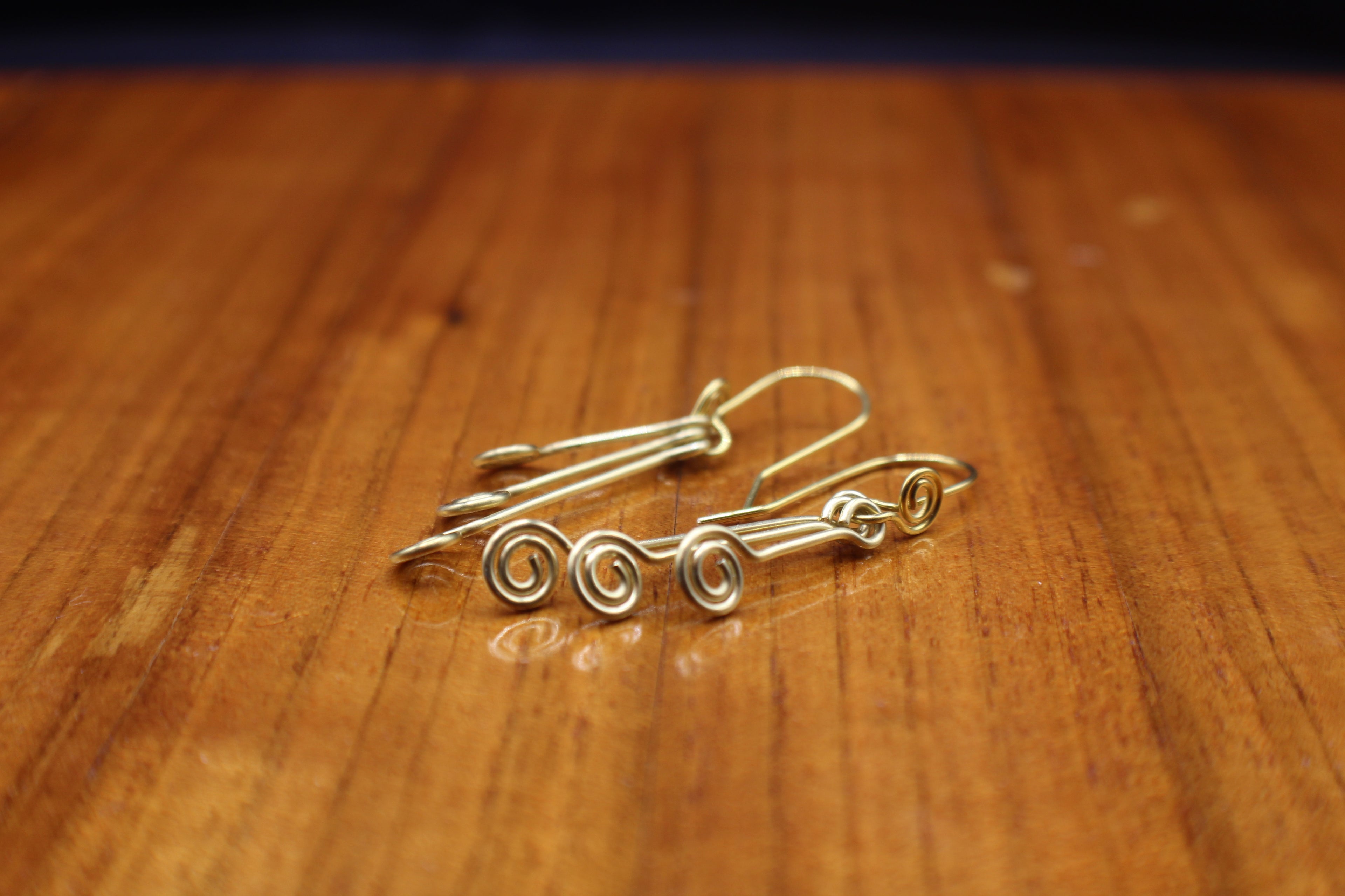 Handcrafted Triple Spiral Dangle Earrings in Brass