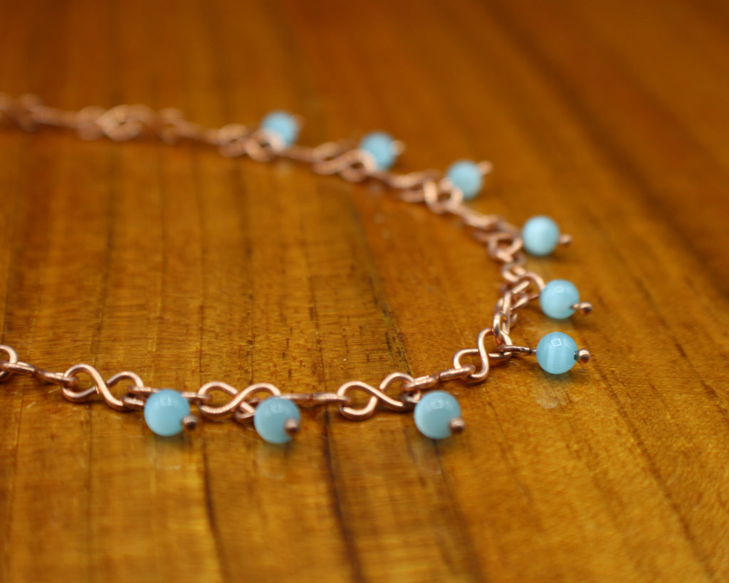 Handcrafted Copper Infinity Link Necklace with Cat’s Eye Glass Beads, Adjustable 16"–18"